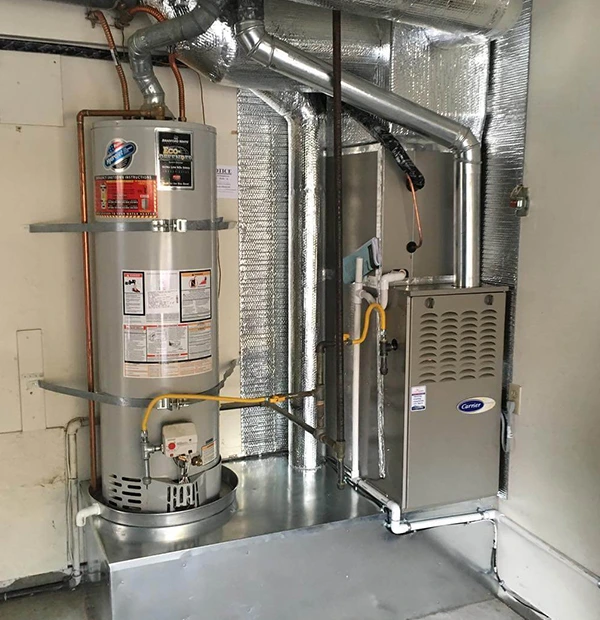 Carrier furnace and water heater in a utility room