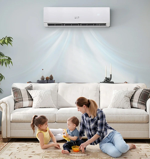 Family enjoying cool air from an AC unit on a hot day